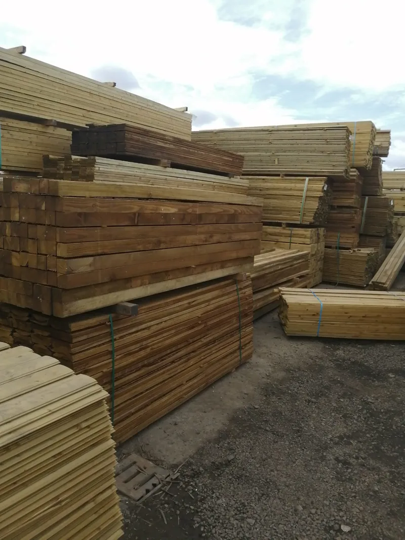 Rows of treated timber packs in the yard